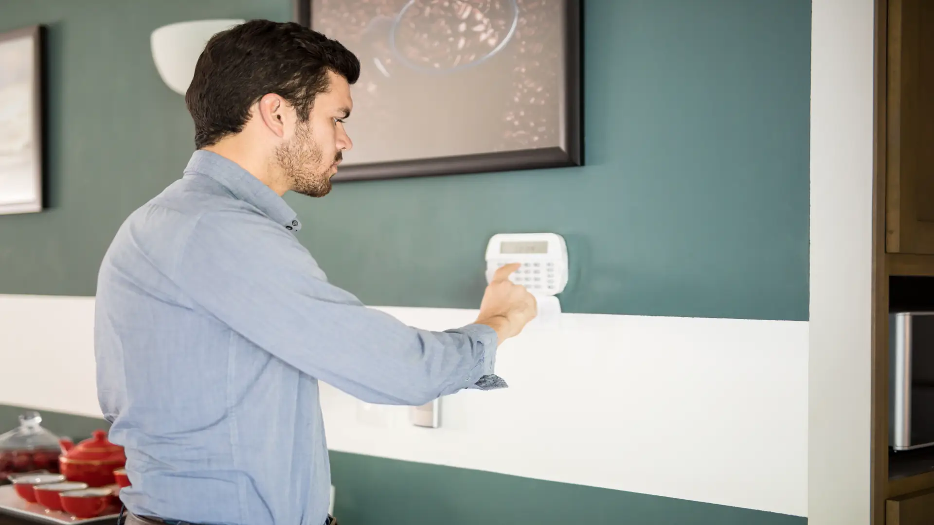 Home security system installation Toronto, alarm panel and smart sensors