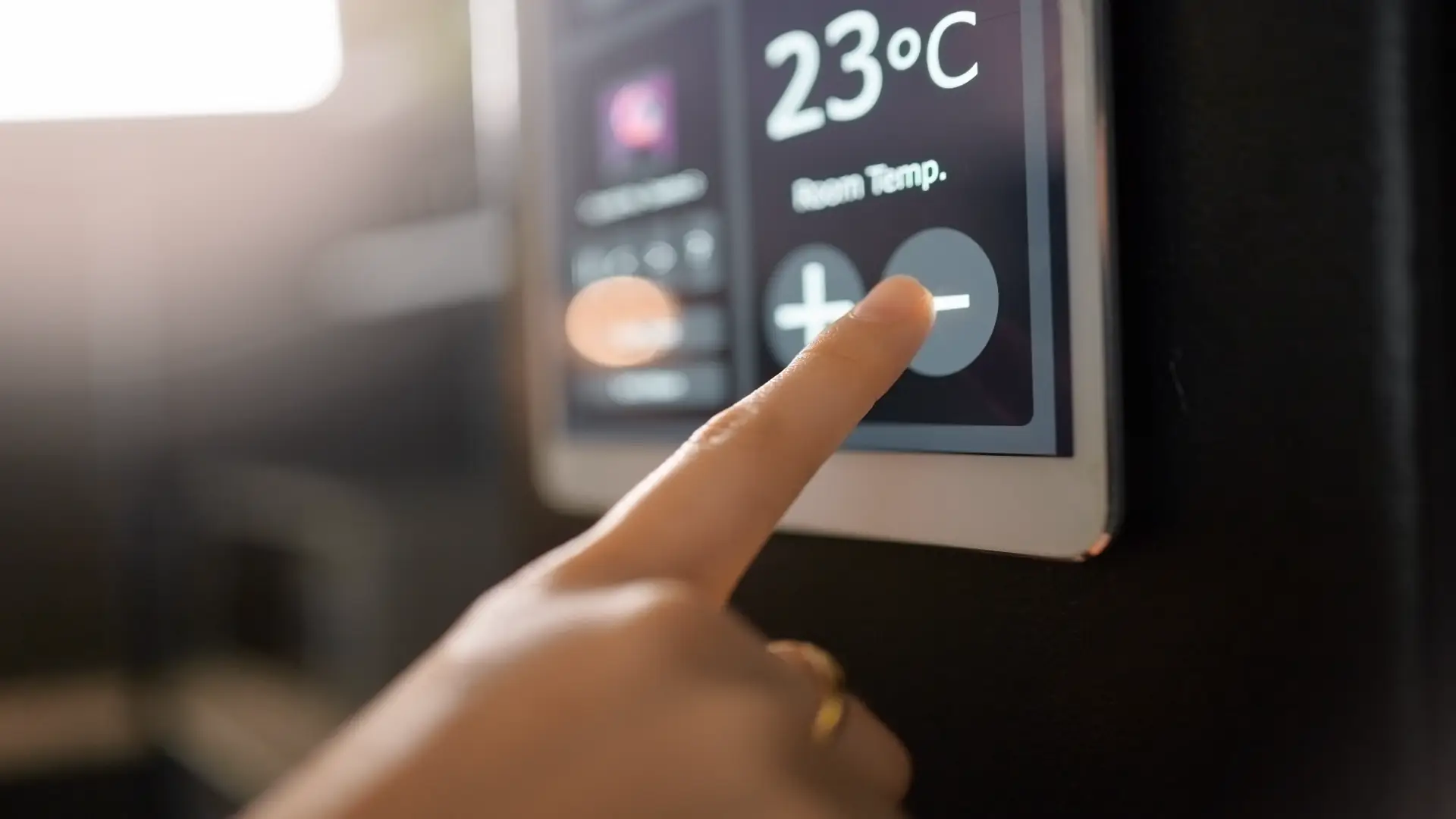 Smart home system wall with woman's hands