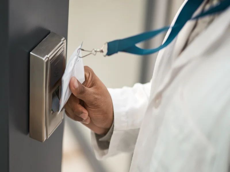 Unrecognizable scientist using laboratory equipment